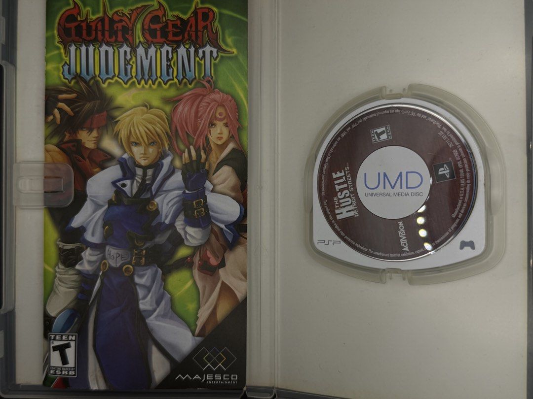 Guilty Gear Judgment PSP UMD Game (Category: PlayStation) located in Las Pinas. Submitted by cjdmc (Listing ID 1445857991, Image 3). Description: - Guilty Gear Judgment for PSP - UMD disc and case included - 2 games in 1 action-packed brawler - 18 levels of side-scrolling action - 2-player wireless co-op - Multiple modes: Survival, Story, and more - Features 21 playable characters.