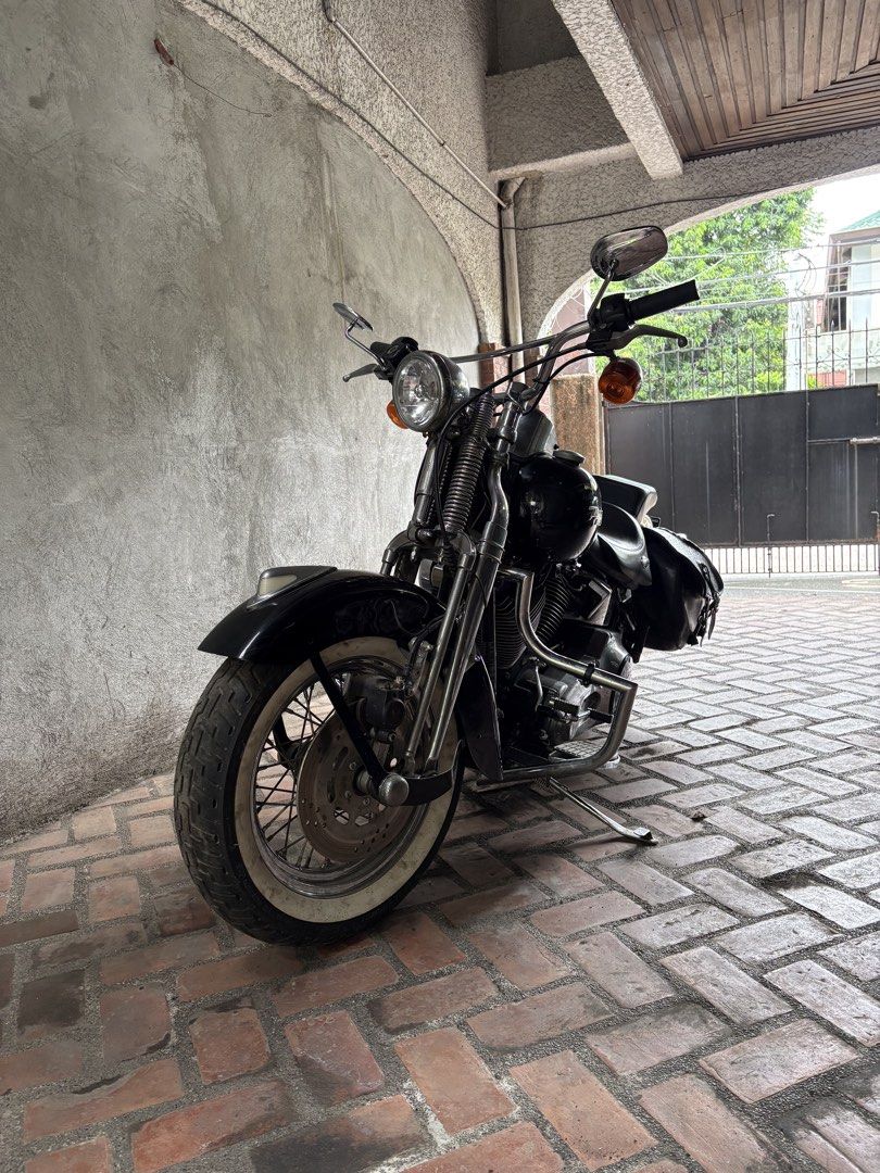 Harley-Davidson Motorcycle with Saddlebags (Category: Motorbikes for Sale) located in Quezon City. Submitted by 33mdmc (Listing ID 1445850812, Image 3). Description: Classic black Harley-Davidson motorcycle. Equipped with leather saddlebags for storage. Whitewall tires add to the vintage look. Chrome accents throughout. Ready for the road. Great for cruising..
