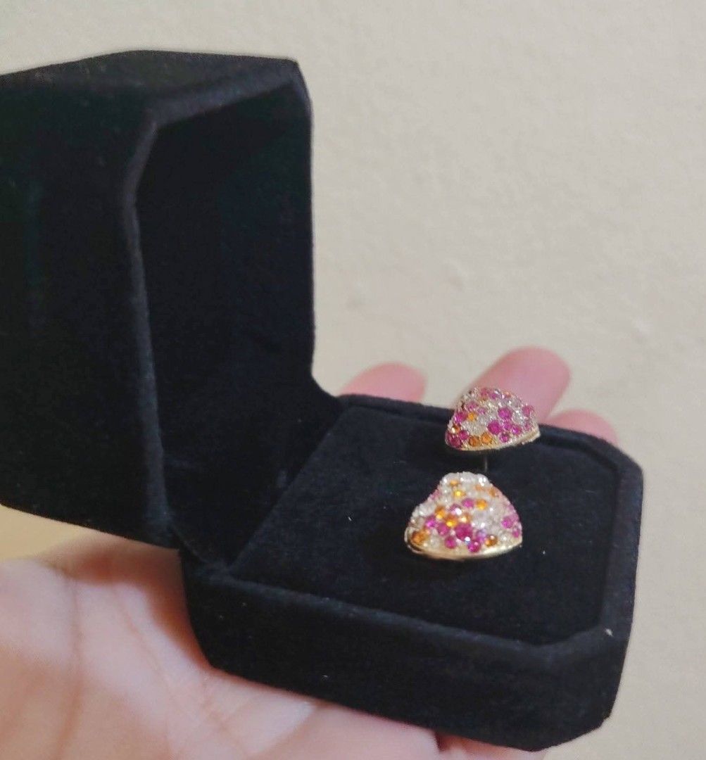 Heart Shaped Stud Earrings with Colorful Gems (Category: Earrings) located in Baguio. Submitted by thrifty_cool (Listing ID 1445796372, Image 2). Description: - Cute heart-shaped stud earrings - Adorned with small, colorful gems (pink, orange, clear) - Includes a black velvet jewelry box - Perfect for adding a pop of color - Features secure screw-on backs.