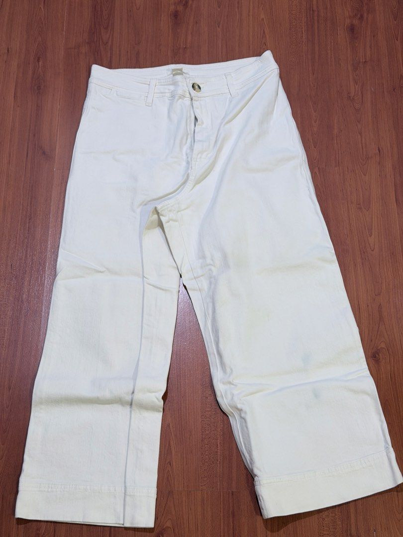 H&M Cream Wide Leg Cropped Pants (Category: Other Bottoms) located in Pasig City. Submitted by thrift_trove (Listing ID 1445816751, Image 1). Description: - Cream colored pants - Brand: H&M - Style: Wide leg, cropped - Closure: Button and zip front - Size: US 14.