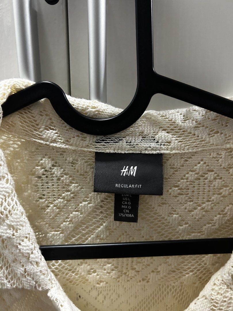 H&M Regular Fit Lace Shirt (Category: Tshirts & Polo Shirts ) located in Cainta. Submitted by hoshosh (Listing ID 1445893163, Image 2). Description: - Cream colored H&M shirt - Short sleeves - Collared neckline - all-over lace pattern - Button-up front - Relaxed fit.