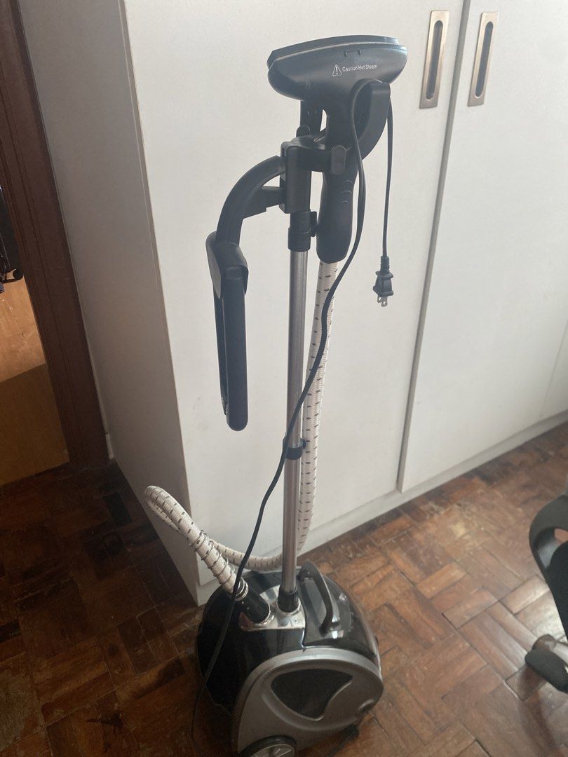 Home Touch Garment Steamer with Stand (Category: Irons & Steamers) located in Pasig City. Submitted by angelaaaj (Listing ID 1445839496, Image 2). Description: ‼️ 110 VOLTAGE (won't work for 220V) ‼️ - Standing garment steamer for quick clothing refresh - Hose and steamer head are attached - Base has wheels for easy movement - Works well and ready for a new home.