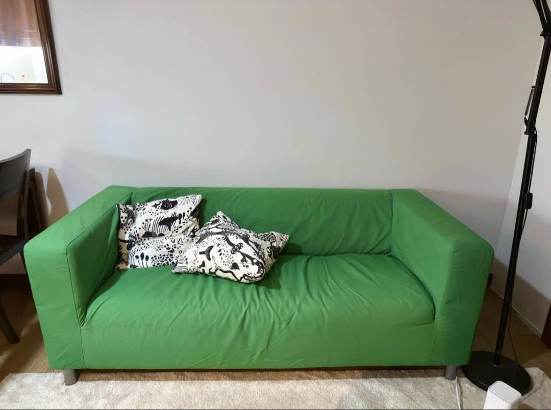 IKEA KLIPPAN 2-Seater Sofa - Vissle Green (Category: Sofas) located in Taguig. Submitted by i_clothess (Listing ID 1445942715, Image 1). Description: - IKEA KLIPPAN 2-seater sofa - Color: Vissle green - Compact design, ideal for smaller spaces - Removable and washable cover for easy cleaning - Includes two black and white patterned cushions - White sofa frame - Easy to assemble and move.