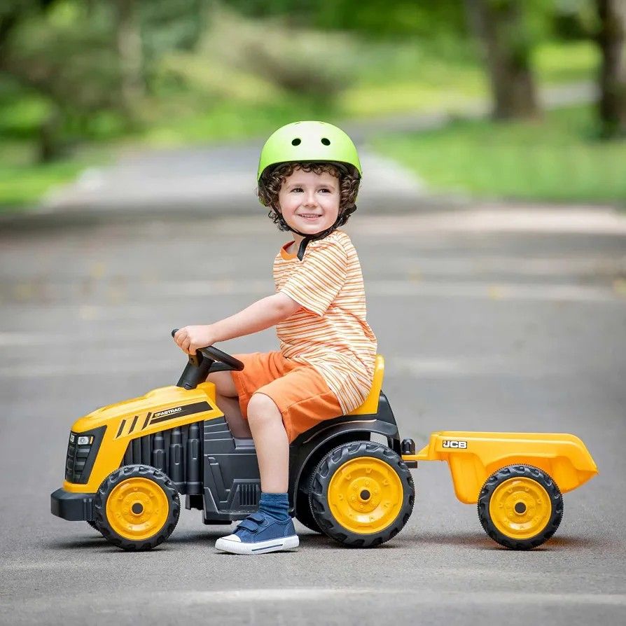 JCB Ride-On Quad Bike with Trailer (Category: Kids Toys) located in Pasig City. Submitted by pepperoo (Listing ID 1445809768, Image 2). Description: - Yellow JCB Quad Bike with detachable trailer - Ideal for outdoor play in the garden or park - Durable plastic construction for long-lasting fun - Perfect for kids who love construction vehicles - Trailer can be used to carry toys and treasures.