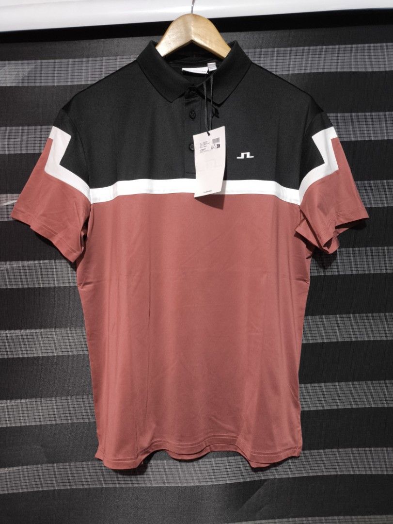 j.lindeberg Polo Shirt (Category: Tshirts & Polo Shirts ) located in Manila. Submitted by joshramly (Listing ID 1445860265, Image 1). Description: - J.Lindeberg polo shirt - Unique blue and black pattern - Classic polo collar - Short sleeves - Features the J.Lindeberg logo - Perfect for a casual, fashionable look.