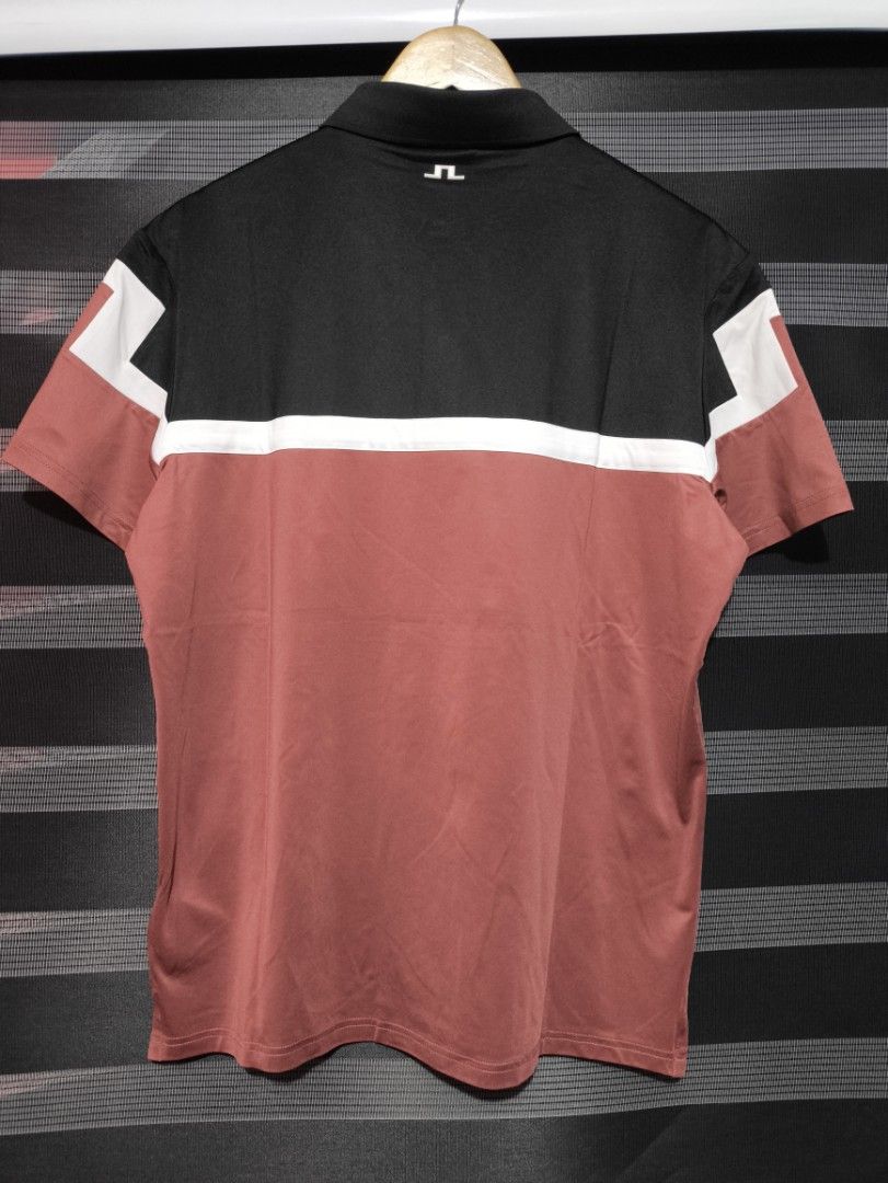 j.lindeberg Polo Shirt (Category: Tshirts & Polo Shirts ) located in Manila. Submitted by joshramly (Listing ID 1445860265, Image 2). Description: - J.Lindeberg polo shirt - Unique blue and black pattern - Classic polo collar - Short sleeves - Features the J.Lindeberg logo - Perfect for a casual, fashionable look.