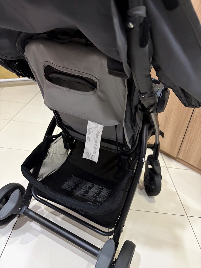 Joie Stroller (Category: Strollers) located in Taguig. Submitted by i.am.johan (Listing ID 1445905361, Image 2). Description: - Grey Joie stroller - Tray with cup holders - Ample storage basket underneath - Secure safety harness - Folds compactly for easy storage - Ready for your little one's adventures!.