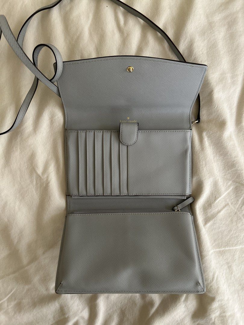 Kate Spade Wallet on Chain Light Blue (Category: Luxury Bags & Wallets) located in Makati City. Submitted by leannd (Listing ID 1445844832, Image 2). Description: - Light blue Kate Spade wallet on chain - Multiple card slots - Zippered compartment - Adjustable strap - Ideal for carrying essentials.
