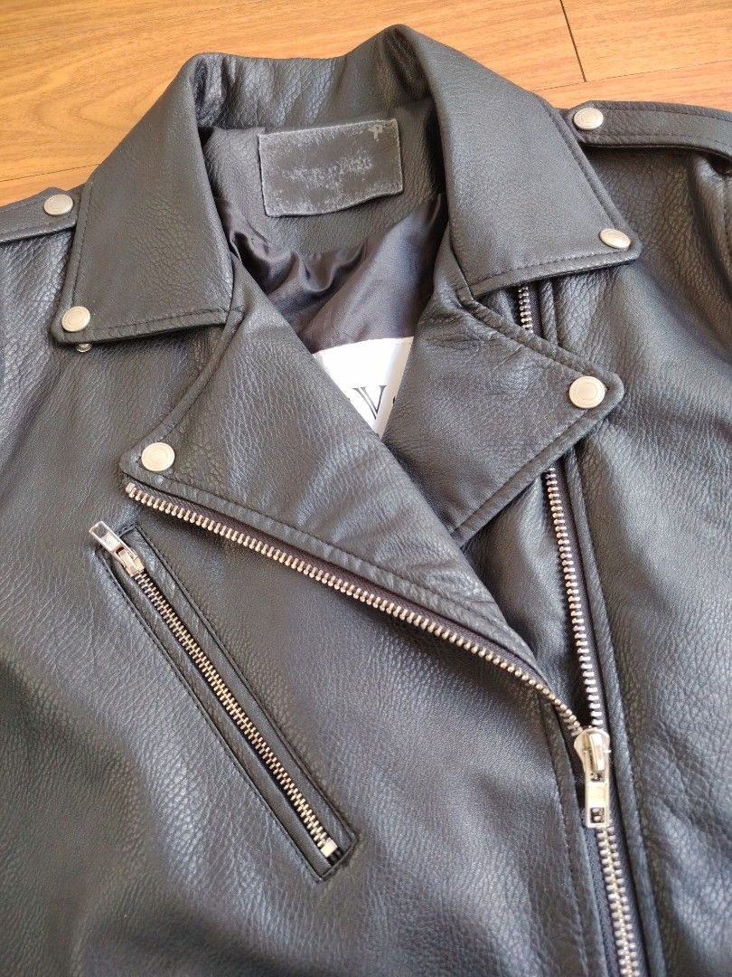 Leather Jacket (Category: Coats, Jackets and Outerwear) located in Paranaque City. Submitted by juanlove26 (Listing ID 1445860577, Image 3). Description: Dress Volume Biker Leather Jacket Korean Brand 22 width X 27 length Good overall condition Issue: Unnoticeable pricks 3,000.