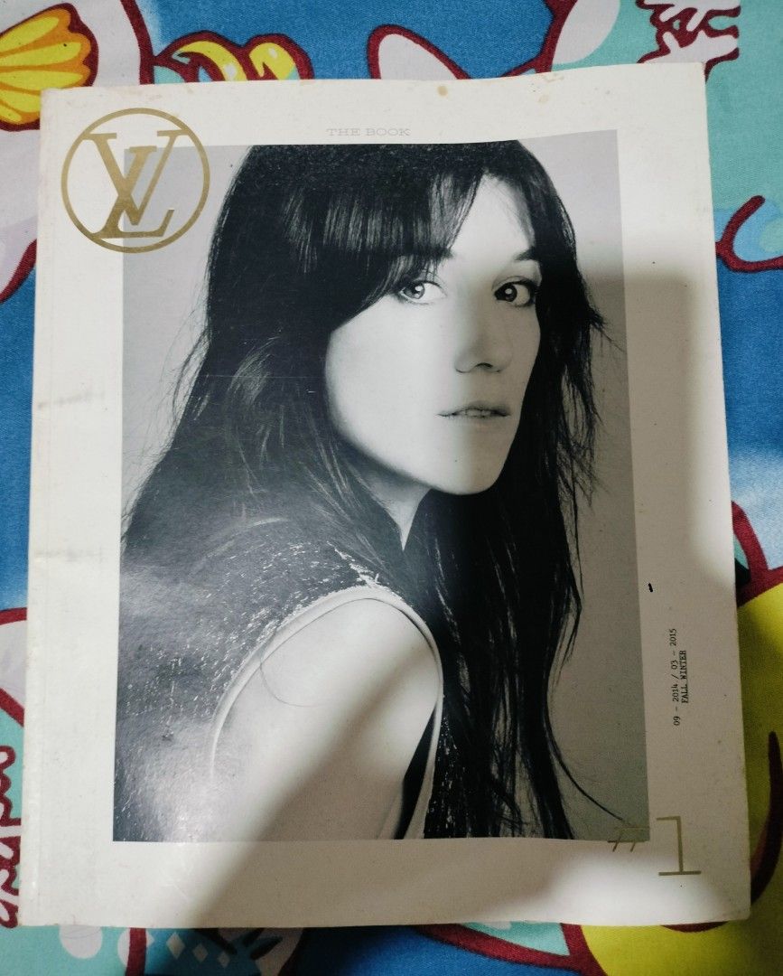 Louis Vuitton The Book Magazine (Category: Magazines) located in Cabanatuan. Submitted by silentcat.82a6b6 (Listing ID 1445951242, Image 1). Description: - Collectible Louis Vuitton The Book magazine - Features a striking black and white portrait on the cover - Iconic gold Louis Vuitton logo detail - A must-have for fashion enthusiasts and collectors - Ideal for display or as a reference piece.