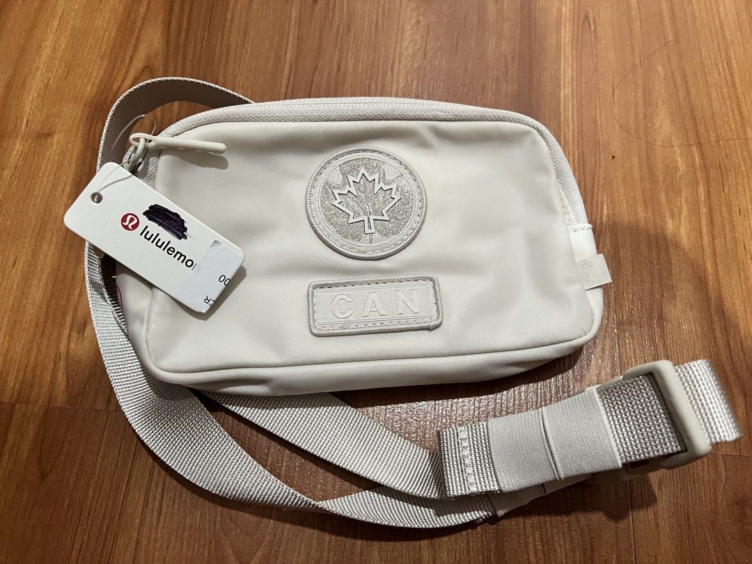 Lululemon Future Legacy Mini Belt Bag White CAN Olympic Edition (Category: Purses & Pouches) located in Muntinlupa City. Submitted by emvn (Listing ID 1445833110, Image 1). Description: - Lululemon Future Legacy Mini Belt Bag - CANADA Edition (Olympics inspired) - Color: Light cream / Off-white - Adjustable strap for comfortable wear - Spacious enough for your daily essentials - Brand new with original tags attached .