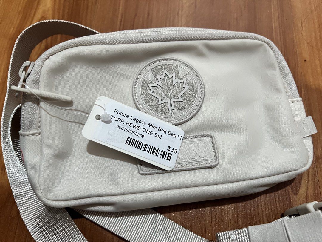 Lululemon Future Legacy Mini Belt Bag White CAN Olympic Edition (Category: Purses & Pouches) located in Muntinlupa City. Submitted by emvn (Listing ID 1445833110, Image 2). Description: - Lululemon Future Legacy Mini Belt Bag - CANADA Edition (Olympics inspired) - Color: Light cream / Off-white - Adjustable strap for comfortable wear - Spacious enough for your daily essentials - Brand new with original tags attached .