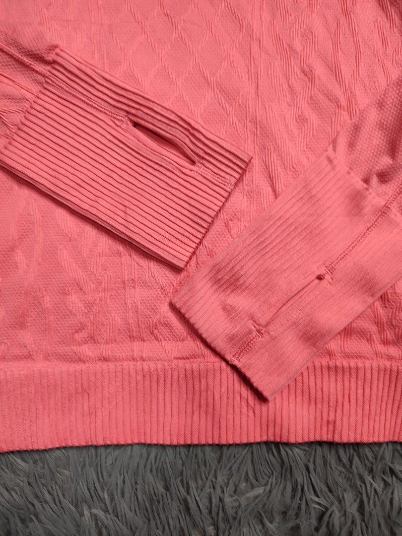 Lululemon Pink Diamond Pattern (Category: Activewear) located in Baguio. Submitted by barepicksph (Listing ID 1445896246, Image 3). Description: - Pink Lululemon sweater - Size 8 - Long sleeves with thumbholes - All-over diamond pattern - Ribbed cuffs and hem - Ideal for workouts or casual wear.