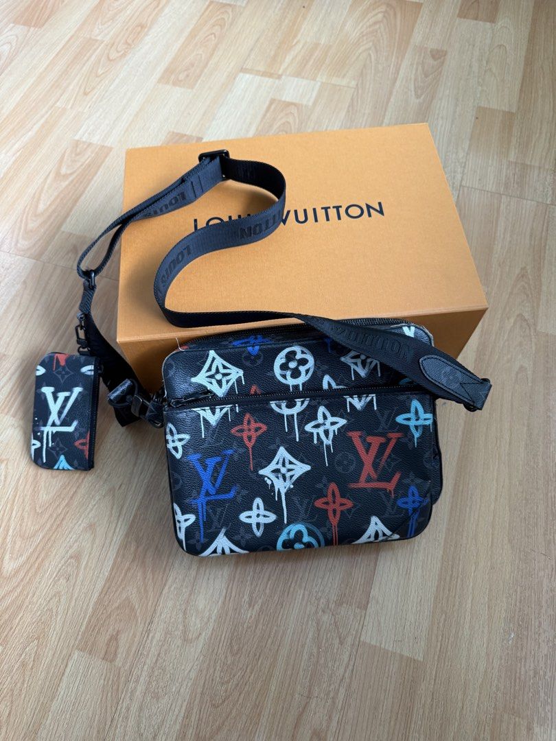 LV Trio Messenger Bag Graffiti (Category: Luxury Bags & Wallets) located in Quezon City. Submitted by declutterwithmeee0555 (Listing ID 1445878455, Image 1). Description: LV Trio Messenger Bag Graffiti Condition: Used 9/10 Inclusions: Box Microchipped SRP 200K.