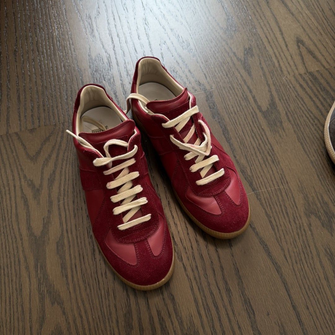 Maison Margiela gats(Burgundy Red) (Category: Sneakers & Footwear) located in Makati City. Submitted by donda.archives (Listing ID 1445839779, Image 2). Description: Size 40-47. Batch with fully built-in NFC chip. Imported INCAS leather used. The leather has a nice matte finish, and the overall shoe shape is solid with no issues. The overall leather color is consistent. Everything follows the same standards: the entire shoe is genuine leather, an