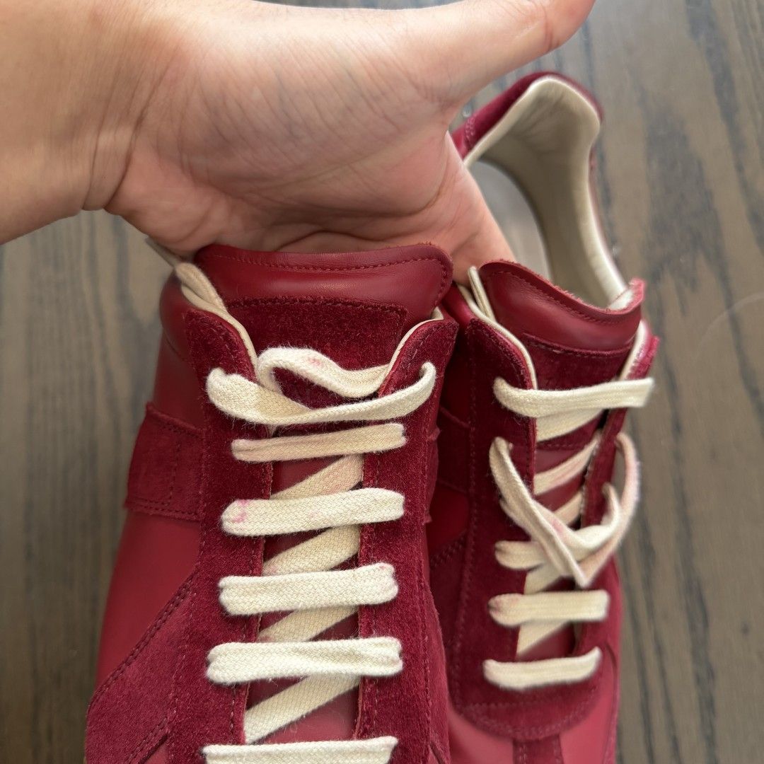 Maison Margiela gats(Burgundy Red) (Category: Sneakers & Footwear) located in Makati City. Submitted by donda.archives (Listing ID 1445839779, Image 3). Description: Size 40-47. Batch with fully built-in NFC chip. Imported INCAS leather used. The leather has a nice matte finish, and the overall shoe shape is solid with no issues. The overall leather color is consistent. Everything follows the same standards: the entire shoe is genuine leather, an