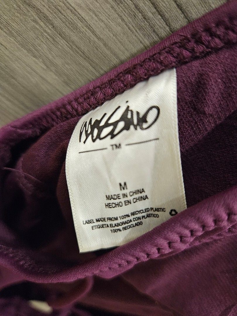 Mossimo One Piece Plum Swimsuit (Category: Bikinis & Swimsuits) located in San Juan City. Submitted by integrale (Listing ID 1445903905, Image 3). Description: - Plum colored one-piece swimsuit - Adjustable tie-back detail - Padded - Size: Medium (M).