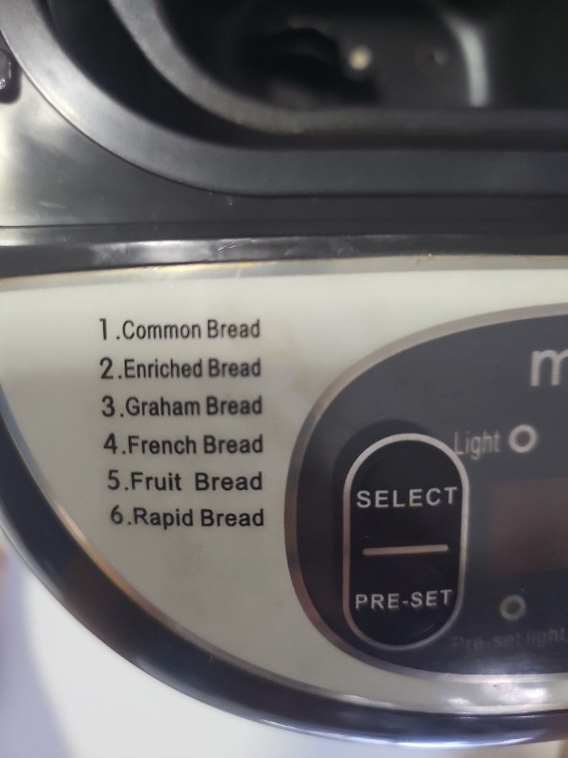Multi-function Bread Maker - 12 Programs (Category: Breadmakers) located in Singapore. Submitted by petermint (Listing ID 1445889199, Image 1). Description: - 12-in-1 Bread Maker: Bake various breads (common, graham, French), cakes, jam, and yogurt. - Advanced Functions: Includes rapid knead, ferment dough, bake, and heat options. - User-Friendly Controls: Easy selection of pre-set programs, crust color, and start/stop. - Effortless Homemade Baki