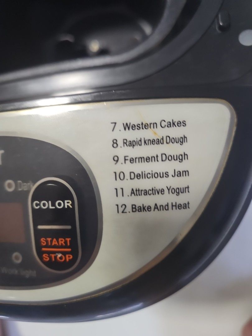 Multi-function Bread Maker - 12 Programs (Category: Breadmakers) located in Singapore. Submitted by petermint (Listing ID 1445889199, Image 2). Description: - 12-in-1 Bread Maker: Bake various breads (common, graham, French), cakes, jam, and yogurt. - Advanced Functions: Includes rapid knead, ferment dough, bake, and heat options. - User-Friendly Controls: Easy selection of pre-set programs, crust color, and start/stop. - Effortless Homemade Baki