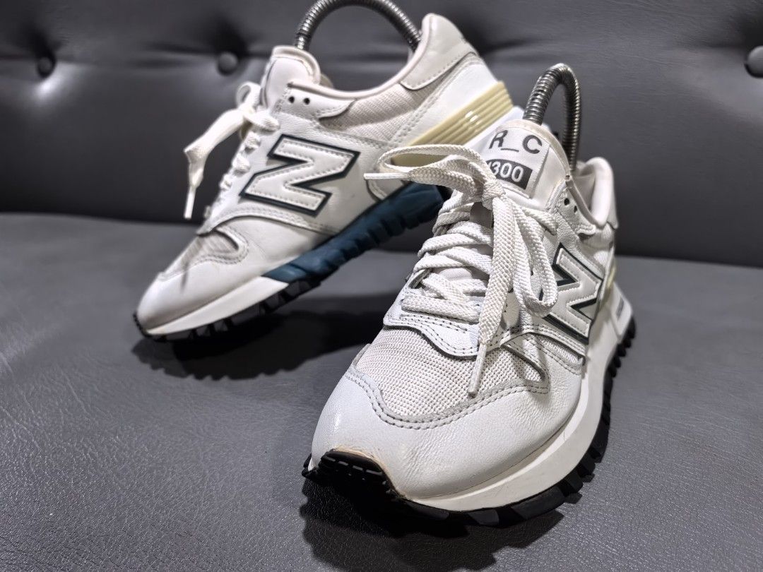 New Balance RC300 Running Shoes (Category: Sneakers) located in Cagayan de Oro. Submitted by pootx (Listing ID 1445949572, Image 1). Description: New Balance RC300 running shoes. White and grey colorway. Size 6 US Men's / 37.5 EU. Features ABZORB cushioning and Vibram outsole for grip. Some signs of wear, check photos for details. Great for everyday wear or light running..