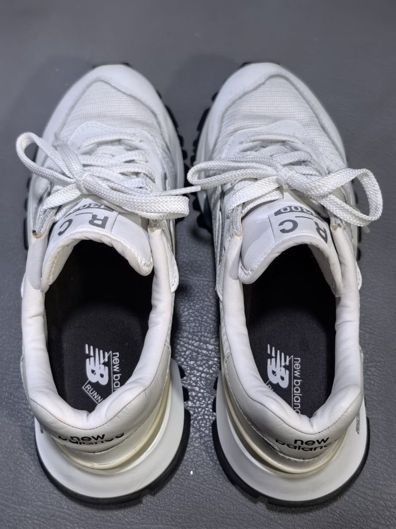 New Balance RC300 Running Shoes (Category: Sneakers) located in Cagayan de Oro. Submitted by pootx (Listing ID 1445949572, Image 3). Description: New Balance RC300 running shoes. White and grey colorway. Size 6 US Men's / 37.5 EU. Features ABZORB cushioning and Vibram outsole for grip. Some signs of wear, check photos for details. Great for everyday wear or light running..