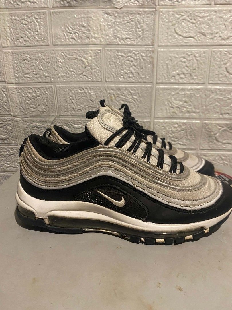 Nike Air Max 97 Silver Bullet | US 8 | Needs Wash | Preloved (Category: Casual Shoes) located in Pasay City. Submitted by classicph. (Listing ID 1445938469, Image 2). Description: Brand: Nike Model: Air Max 97 "Silver Bullet" Size: US 8 / EU 41 / 26cm Color: Silver/Black/White Condition: 6/10 - Need wash lang, may signs of use pero no major flaws Details: Full-length Air Max unit, mesh + synthetic upper, iconic wave design, black laces. Issue: Ne