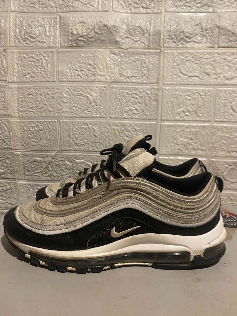 Nike Air Max 97 Silver Bullet | US 8 | Needs Wash | Preloved (Category: Casual Shoes) located in Pasay City. Submitted by classicph. (Listing ID 1445938469, Image 3). Description: Brand: Nike Model: Air Max 97 "Silver Bullet" Size: US 8 / EU 41 / 26cm Color: Silver/Black/White Condition: 6/10 - Need wash lang, may signs of use pero no major flaws Details: Full-length Air Max unit, mesh + synthetic upper, iconic wave design, black laces. Issue: Ne
