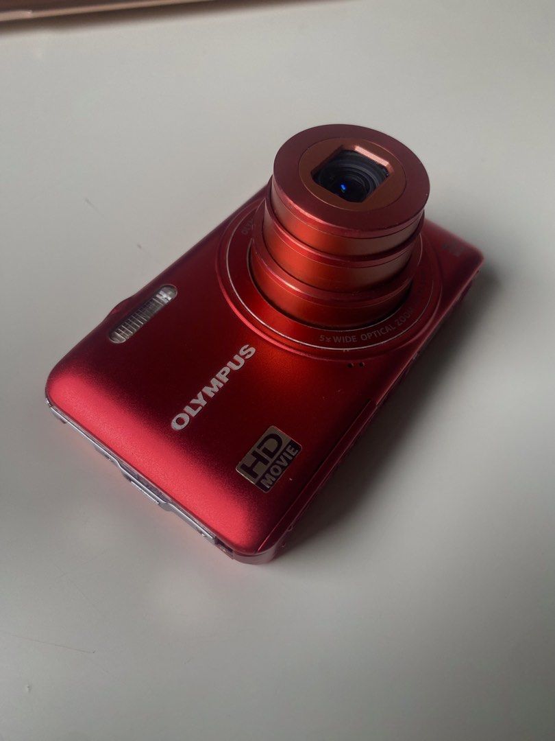 Olympus VG-160 Digital Camera (Category: Cameras) located in Manila. Submitted by simsmods (Listing ID 1445896614, Image 3). Description: Olympus VG-160 Red Great Budget Digital Camera - Working Flash - 14MP Built-in for a clean mid-2000 look - Comes with a 4GB card for quick data transfer Inclusions: ✅ Olympus LI-70C Charger ✅ Battery ✅ 4GB Memory Card Issues: - buttons doesn't work but can take pics. PM for more information .