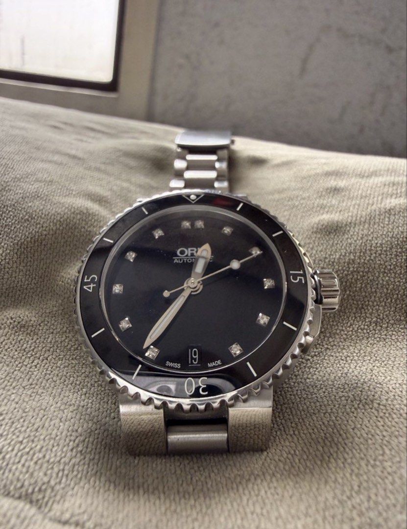 Oris Automatic Dive Watch Black Dial Diamond Markers (Category: Men's Watches) located in Marikina City. Submitted by moonchok (Listing ID 1445901040, Image 3). Description: AUTHENTIC ORIS AQUIS BLACK DIAL WITH DIAMONDS MY FIRST AUTOMATIC WATCH 36MM COMPLETE SET! NO FAKE ORIS SO KUNG FAKE SAYO NA! DM FOR SURE BUYERS ONLY!.