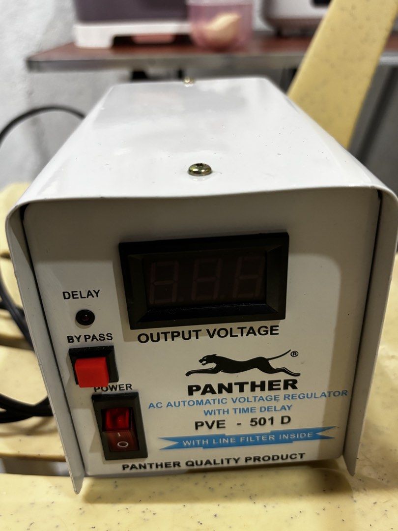 Panther PVE-501 D AC Automatic Voltage Regulator (Category: Electrical, Adaptors & Sockets) located in San Antonio. Submitted by mauvelotus (Listing ID 1445950429, Image 1). Description: - Panther AC Automatic Voltage Regulator - Model: PVE-501 D - Protects appliances from voltage fluctuations - Input Voltage: 180V AC - 250V AC - Output Voltage: 220V AC +/- 5% - Frequency: 60Hz - Maximum Capacity: 500 Watts - Time Delay: Approx 3-5 minutes - Feat