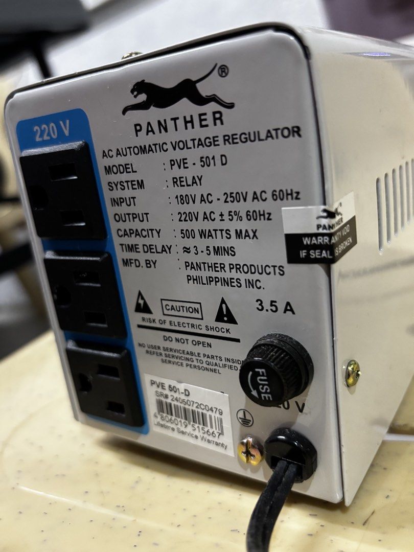 Panther PVE-501 D AC Automatic Voltage Regulator (Category: Electrical, Adaptors & Sockets) located in San Antonio. Submitted by mauvelotus (Listing ID 1445950429, Image 2). Description: - Panther AC Automatic Voltage Regulator - Model: PVE-501 D - Protects appliances from voltage fluctuations - Input Voltage: 180V AC - 250V AC - Output Voltage: 220V AC +/- 5% - Frequency: 60Hz - Maximum Capacity: 500 Watts - Time Delay: Approx 3-5 minutes - Feat
