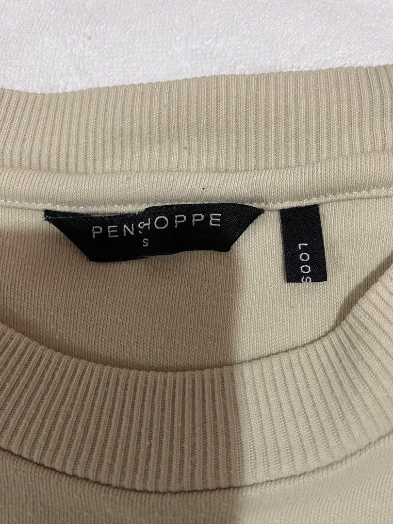 PENSHOPPE Beige T-shirt Size S (Category: Tshirts & Polo Shirts ) located in San Fernando. Submitted by celinaco (Listing ID 1445952680, Image 2). Description: - Brand: PENSHOPPE - Color: Beige - Size: S - Features: Chest pocket - Condition: Minor faint stains on front (please check photos) - Material: Cotton-Polyester blend - Origin: Made in the Philippines - Best for: Casual wear NEGOTIABLE.