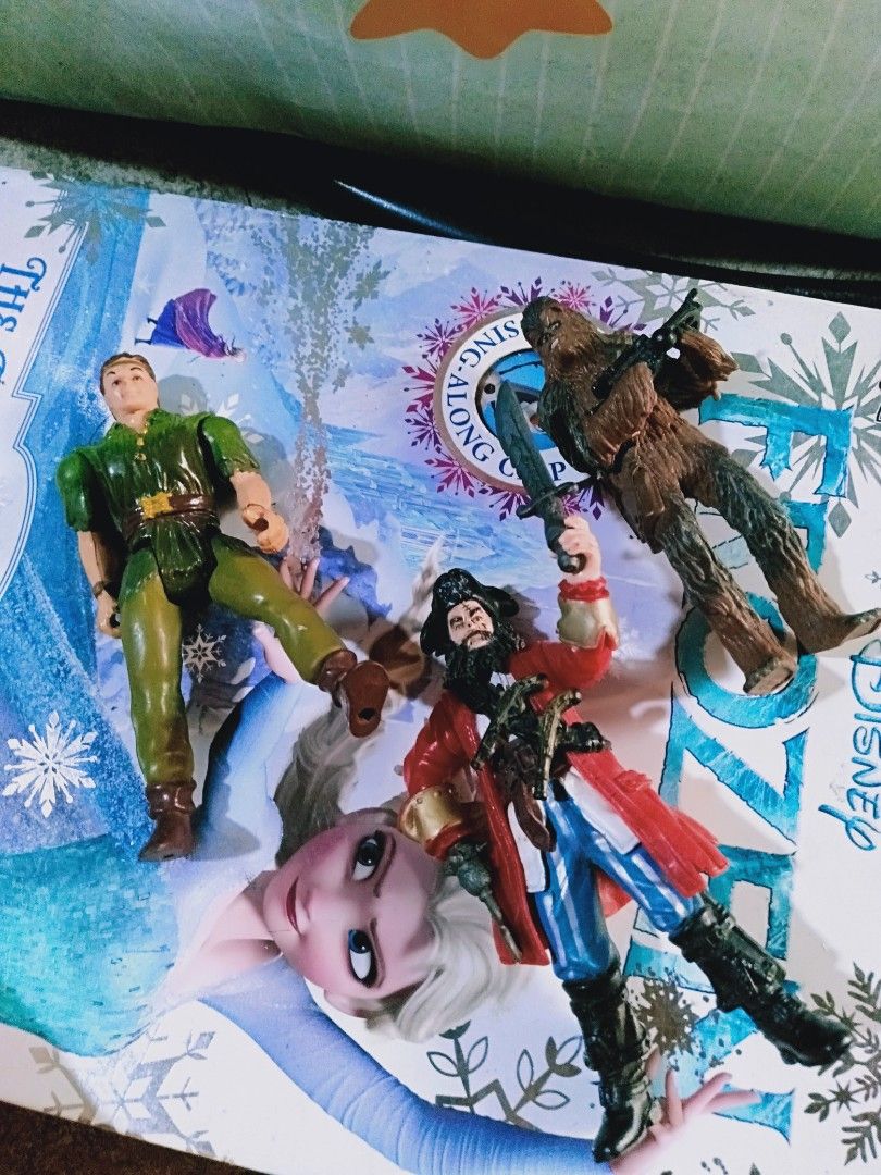 Peter Pan, Captain Jack Sparrow, Chewbacca Action Figures (Category: Figurines & Statues) located in Davao. Submitted by bravemoon_556cd5 (Listing ID 1445877393, Image 1). Description: - Bundle includes 3 collectible action figures. - Characters: Peter Pan, Captain Jack Sparrow (Pirates of the Caribbean), Chewbacca (Star Wars). - Figures are pre-owned and have been displayed. - Great for fans and collectors of these iconic characters..