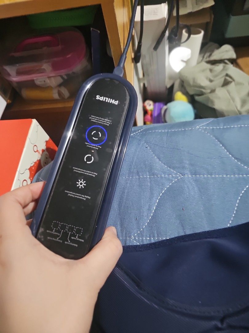 Philips Knee Massage Device with Controller (Category: Massage Devices) located in Manila. Submitted by jtlim516 (Listing ID 1445917403, Image 3). Description: - Philips massage device in dark blue - Comes with an easy-to-use controller - Multiple settings: adjustable intensity and modes - Perfect for relaxation and muscle relief - Lightly used, in good working condition.