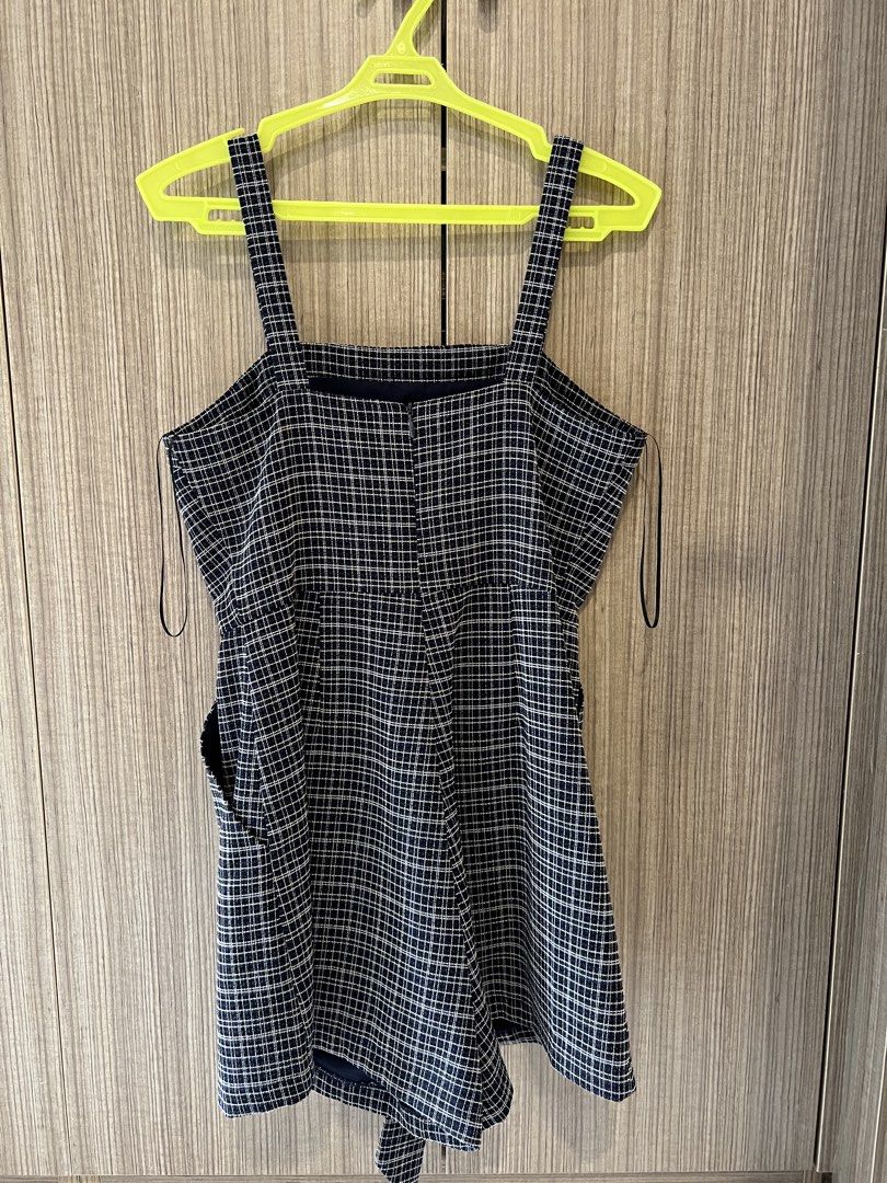 PLAYDRESS Plaid Square Neck Playsuit (Category: Rompers) located in Manila. Submitted by thesharedit (Listing ID 1445815457, Image 2). Description: - Cute plaid playsuit from PLAYDRESS - A singapore brand! - Square neckline with adjustable straps - Includes a tie belt to cinch the waist - Functional side pockets - Zipper closure at the back.