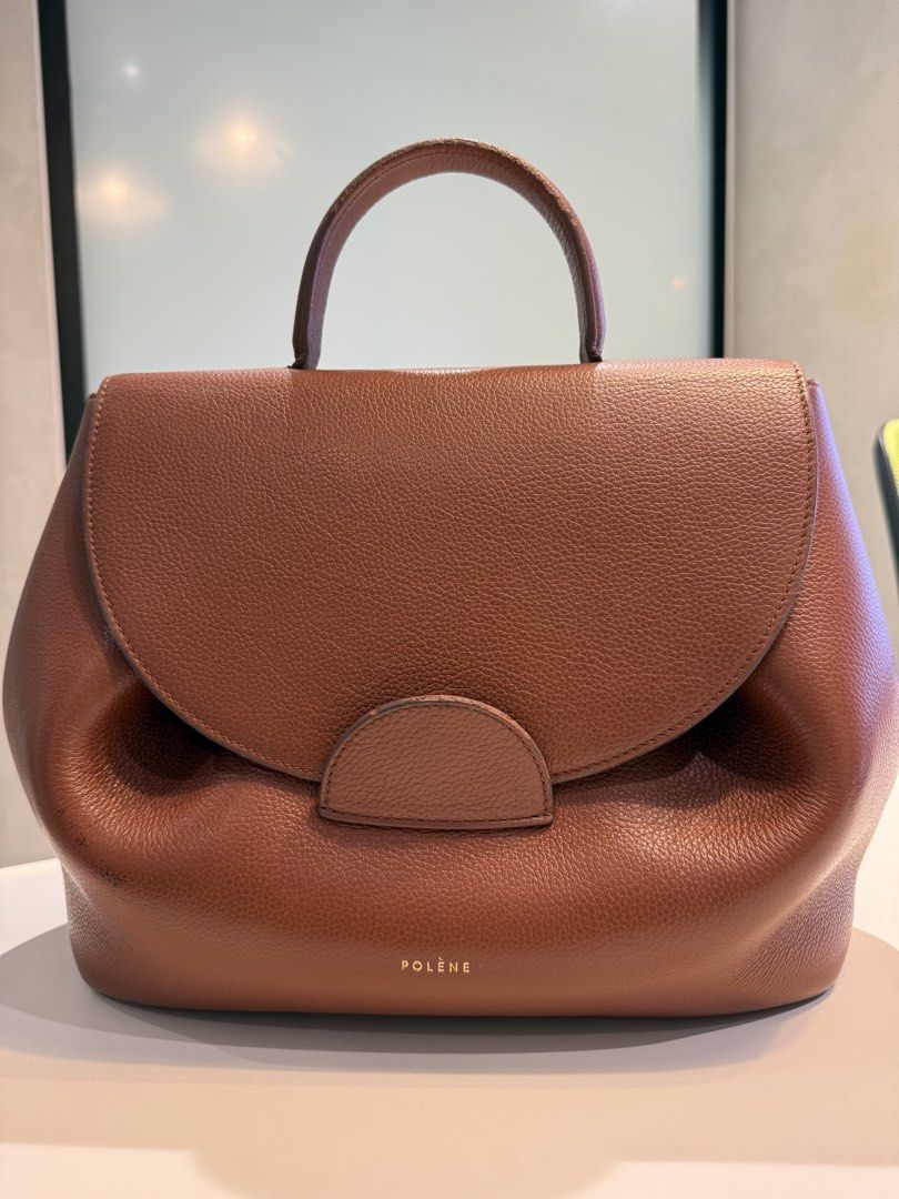 Polene Numéro Un bag in Camel (Category: Shoulder Bags) located in Makati City. Submitted by shesellsseashells01 (Listing ID 1445867421, Image 1). Description: Dimensions: 32 cm × 16.5 cm × 23 cm (approximately 12.5” × 6.5” × 9”) Weight: 925 g (approx. 2 lbs) Strap Drop: Adjustable up to 120 cm Rubber edges are a little worn out. Has an ink mark. No dust bag. Payment methods: Bank transfer/deposit via BDO or BPI GCash 1. Please send screenshot of