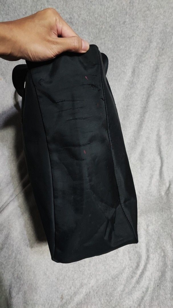 Prada Black Nylon traveling Bag (Category: Luxury Bags & Wallets) located in Baguio. Submitted by ozara.06 (Listing ID 1445806467, Image 2). Description: Prada Traveling bag XL size May minimal bubbles sa sides 800.