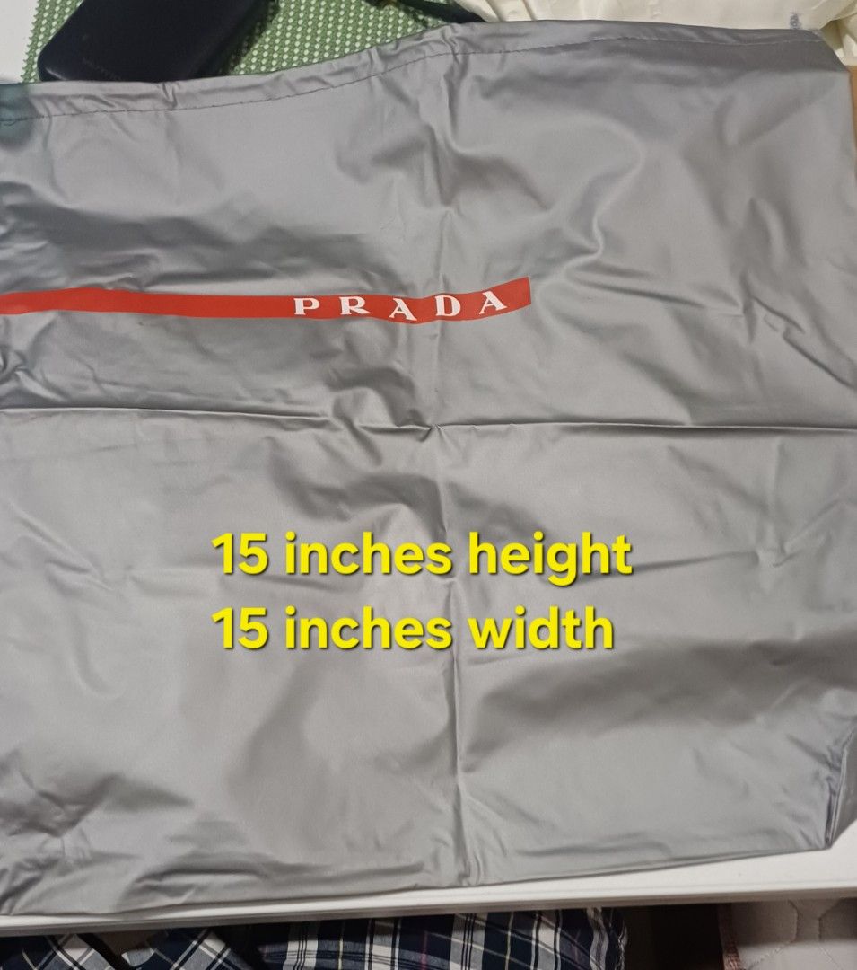 Prada Dustbag (Category: Luxury Bags & Wallets) located in Rizal. Submitted by jekomy (Listing ID 1445876844, Image 1). Description: - Authentic Prada dustbag - Material: PVC cloth - Condition: Like new - Features: Includes original label inside - Dimensions: 15 inches height x 15 inches width.