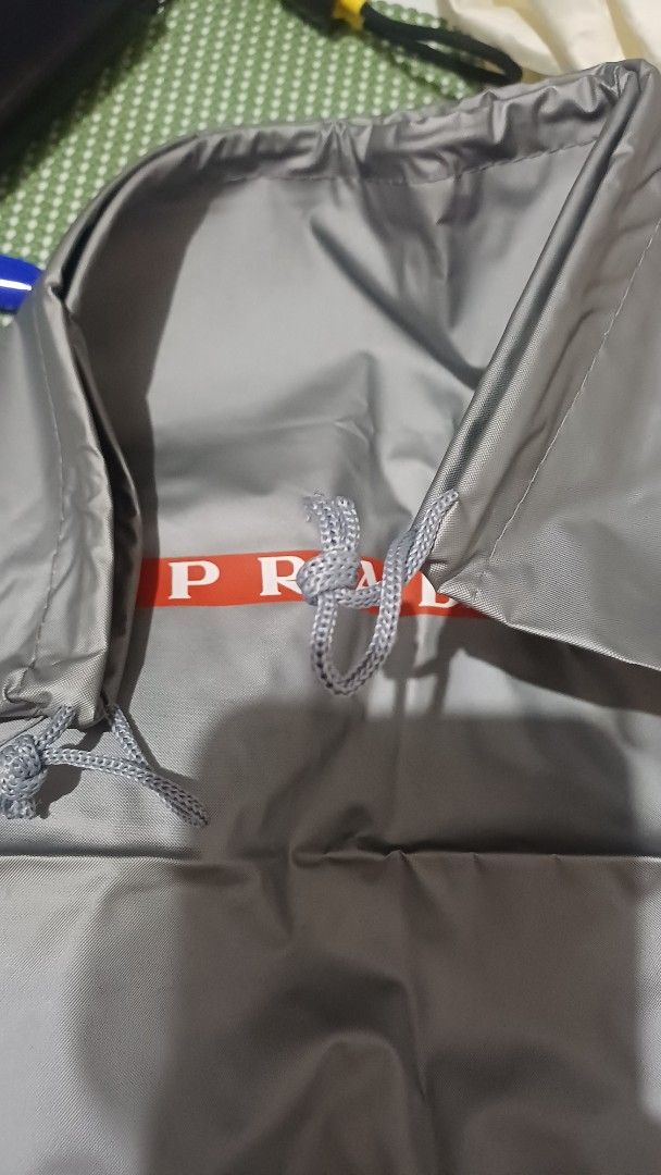 Prada Dustbag (Category: Luxury Bags & Wallets) located in Rizal. Submitted by jekomy (Listing ID 1445876844, Image 3). Description: - Authentic Prada dustbag - Material: PVC cloth - Condition: Like new - Features: Includes original label inside - Dimensions: 15 inches height x 15 inches width.