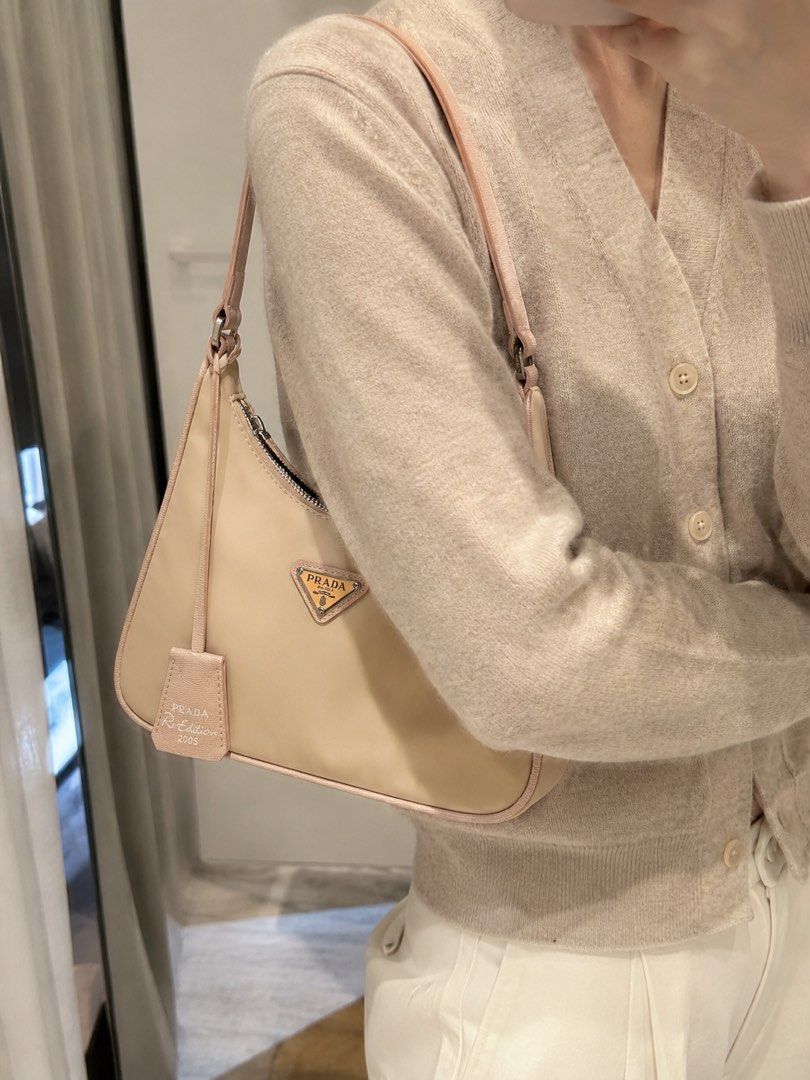 Prada Re-Edition 2005 Re-Nylon mini bag, (Category: Luxury Bags & Wallets) located in San Pedro. Submitted by tinkerkidsph (Listing ID 1445910726, Image 1). Description: Prada Re-Edition 2005 Re-Nylon mini bag - Material: Safiano leather - Color: Desert Beige - Strap & Trim: Desert Beige - Interior: Clean - Includes: Prada Tag - Ideal for: Everyday use Japan sourced. Bought in japan thrift shop Rfs: need funds for school.