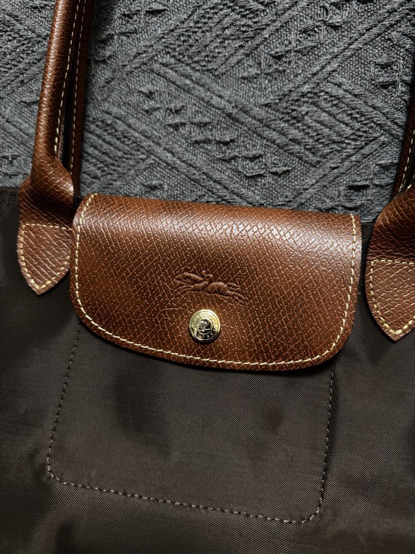 Pre ❤️ Longchamp Le Pliage Long-handle Medium in Ebony (Category: Shoulder Bags) located in Agno. Submitted by ursecondhand_chic (Listing ID 1445918831, Image 2). Description: ❤️❤️Well Loved Longchamp Le Pliage Tote❤️❤️ •What you see is what you get •Medium in size •Color: Ebony (very pretty!) •See pics for your reference - zoom all you want (inspect nyo ng mabuti, you can ask for more pics para makampante 😊) •Original 🫶 but no other inclusions
