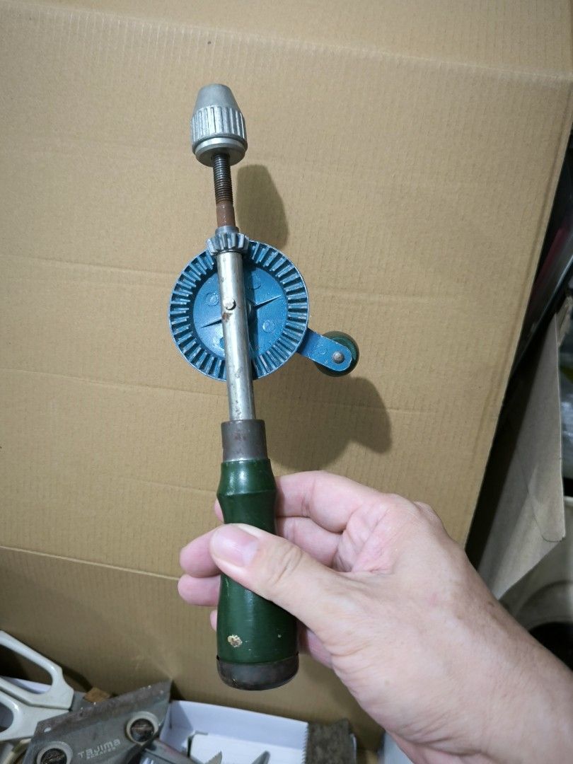 Precision Hand Drill – Ideal for Jewelry Making & Crafts (Category: Construction Tools & Equipment) located in Angeles City. Submitted by yellowbrickstore (Listing ID 1445910979, Image 2). Description: - Precision Hand Drill, perfect for jewelry making and crafts. - Manual operation allows for detailed and controlled drilling. - Features a comfortable green handle for extended use. - Eye-catching blue body and sturdy chuck design. - Ideal for hob