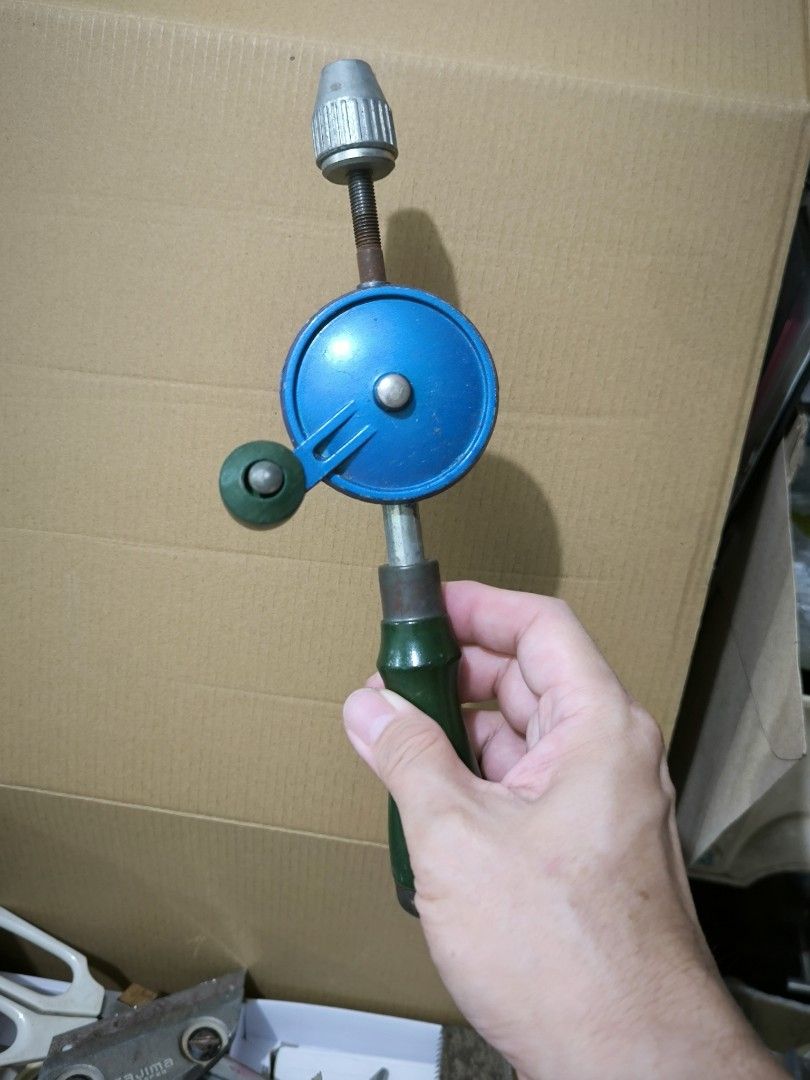 Precision Hand Drill – Ideal for Jewelry Making & Crafts (Category: Construction Tools & Equipment) located in Angeles City. Submitted by yellowbrickstore (Listing ID 1445910979, Image 1). Description: - Precision Hand Drill, perfect for jewelry making and crafts. - Manual operation allows for detailed and controlled drilling. - Features a comfortable green handle for extended use. - Eye-catching blue body and sturdy chuck design. - Ideal for hob