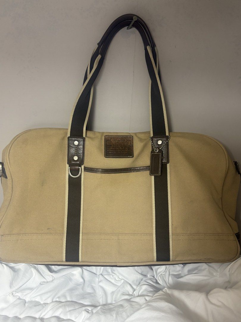 Preloved Vintage Coach Duffle bag (Category: Luxury Bags & Wallets) located in Tacloban City. Submitted by re_store23 (Listing ID 1445926703, Image 1). Description: *What you see is what you get *No sling pd sya masuot as tote bag *Kasya paddle ng pickleball if ever you want to use it as sports bag. *May signs of usage such as Rubs on corner, May dumi on canvass, Oxidation on leather part but this one is vintage and nice pa po. 📍Tacloban City.