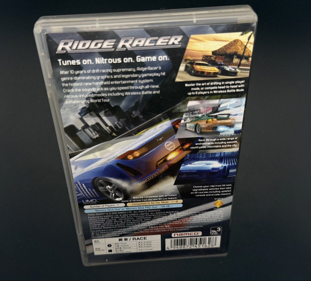 PSP Ridge Racer UMD Game (Category: PlayStation) located in Las Pinas. Submitted by cjdmc (Listing ID 1445856847, Image 2). Description: - Ridge Racer for PSP - Includes UMD disc and original case - Classic, fast-paced racing action - Features cool cars - Perfect for PSP owners seeking a retro racing experience.