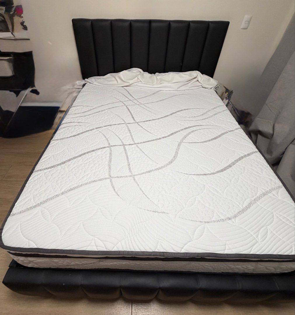 Queen size bed frame and mattress (Category: Bed Frames & Mattresses) located in Quezon City. Submitted by rlschaefer (Listing ID 1445981408, Image 2). Description: - Bed frame - black leather from OUR HOME Mattress - Premium Latex Spring from MANDAUE FOAM BOTH ITEMS ARE IN SUPERB “LIKE NEW” CONDITION - used with Mattress protector (not included) since day 1 - Sold as a set - Pickup only Bought for 44,590.