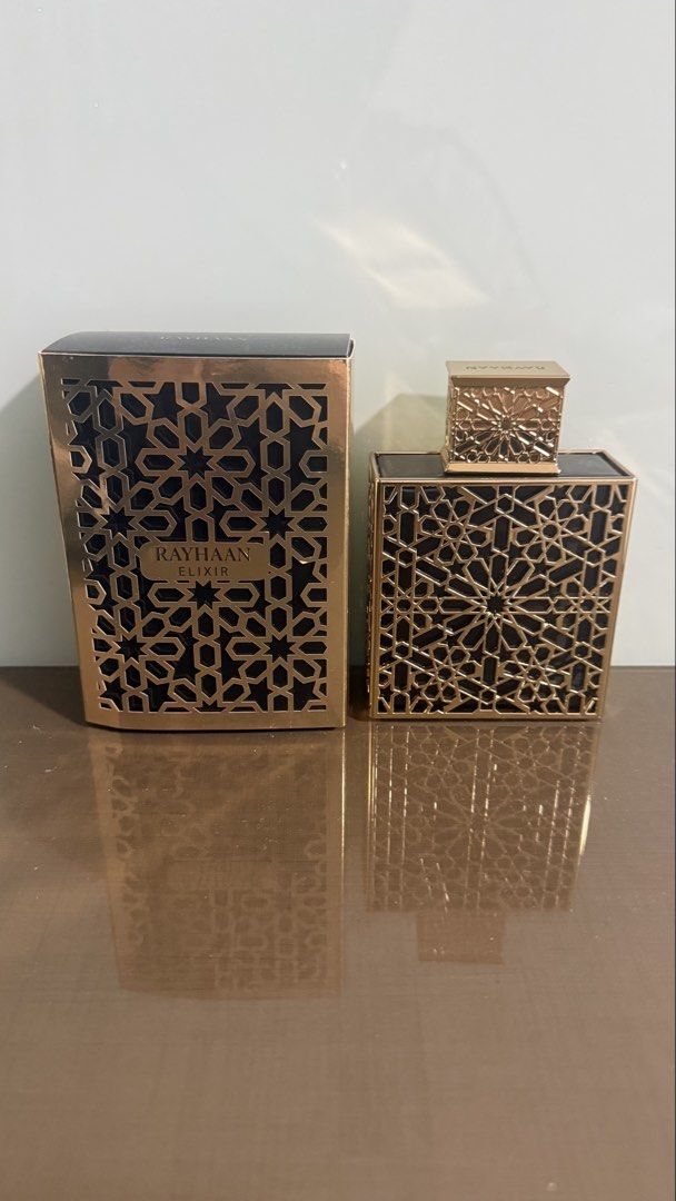 Rayhaan Elixir (Category: Fragrance & Deodorants) located in Singapore. Submitted by youtia08 (Listing ID 1445967621, Image 1). Description: - Rayhaan Elixir perfume bottle and original box. - 99/100ml, only sprayed a couple times to test. - Perfect for display purposes or as a thoughtful gift..
