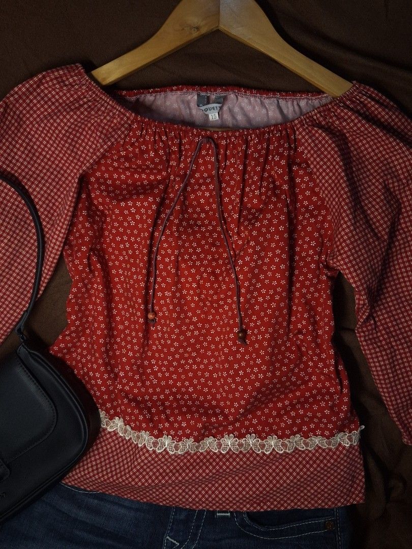 Red Floral Off-Shoulder Top with Gingham Sleeves (Category: Blouses) located in Manila. Submitted by chloe.dc (Listing ID 1445880396, Image 2). Description: DM for inquiries! Size: medium Location: Caloocan ☆ No COD ☆ Manage expectations! Items are preloved/thrifted. ☆ Buyer shoulders shipping fee ☆ MOD is J&T.