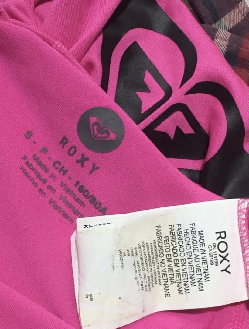 Roxy Pink Long Sleeve Rash Guard - XS (Category: Rash guard) located in Naga. Submitted by Rveebee (Listing ID 1445829056, Image 3). Description: - Pink Roxy long-sleeved rash guard - Features Roxy logo on chest and sleeve - Size: S (But would actually fit XS) - Ideal for swimming and sun protection - Made in Vietnam.