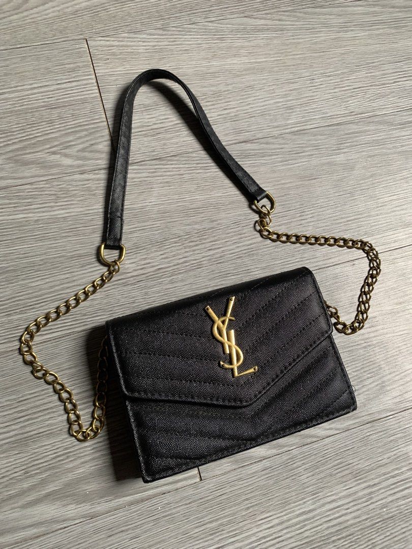 Saint Laurent Small Envelope Wallet (Category: Luxury Bags & Wallets) located in Pozorrubio. Submitted by plco. (Listing ID 1445955320, Image 2). Description: Saint Laurent Small Envelope Wallet Width 7.5inch Height 5.5inch color rate: 10/10 excellent condition no issue.